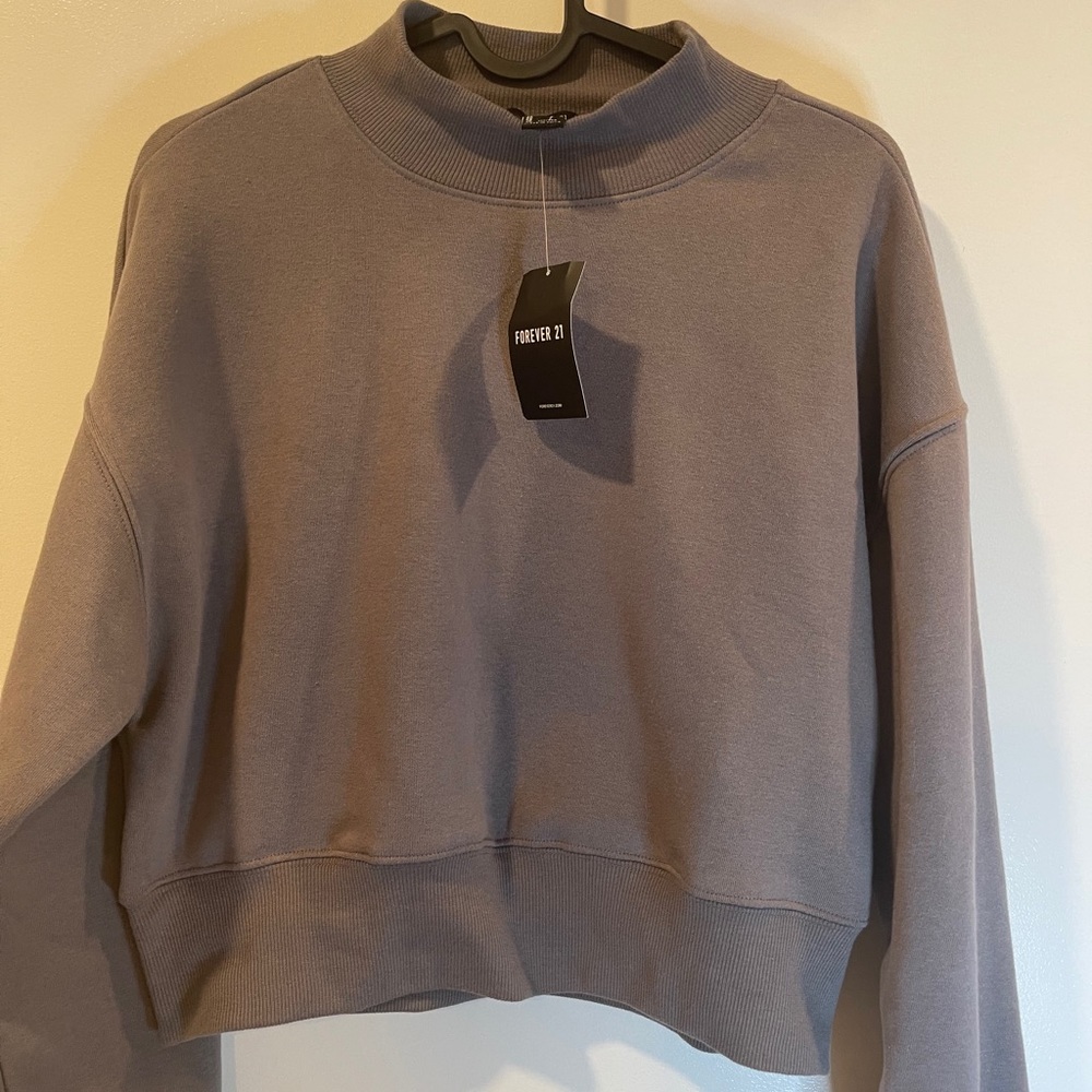 Woman’s cropped sweater